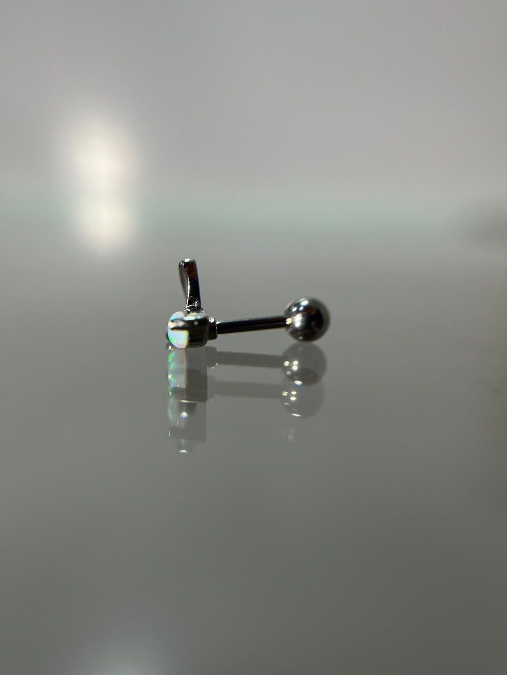 Piercing alas (cierre esfera)