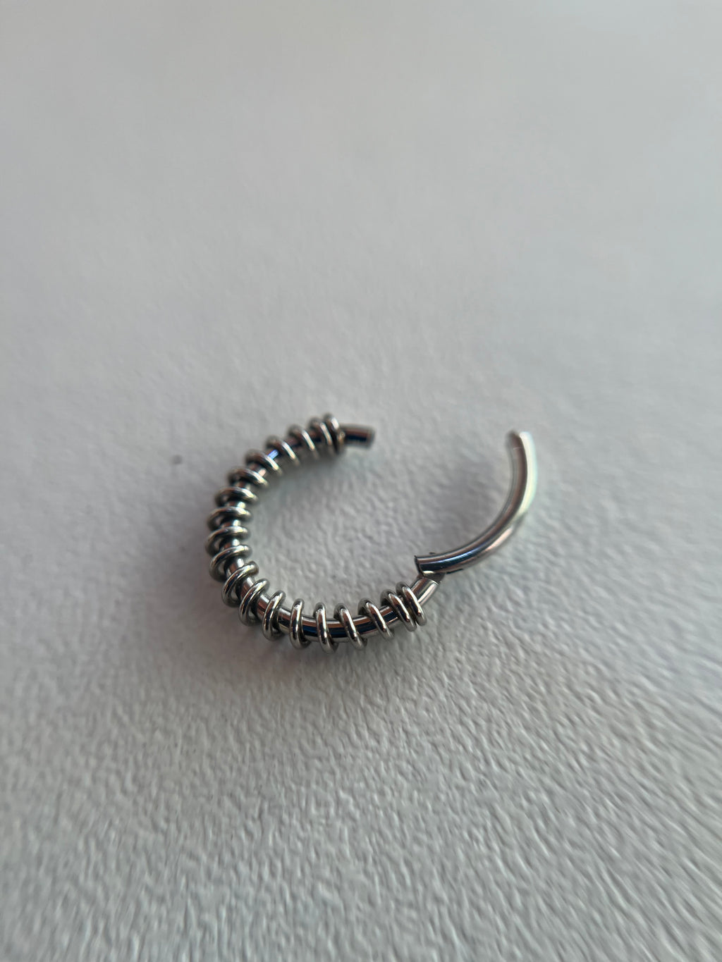 Piercings elástico
