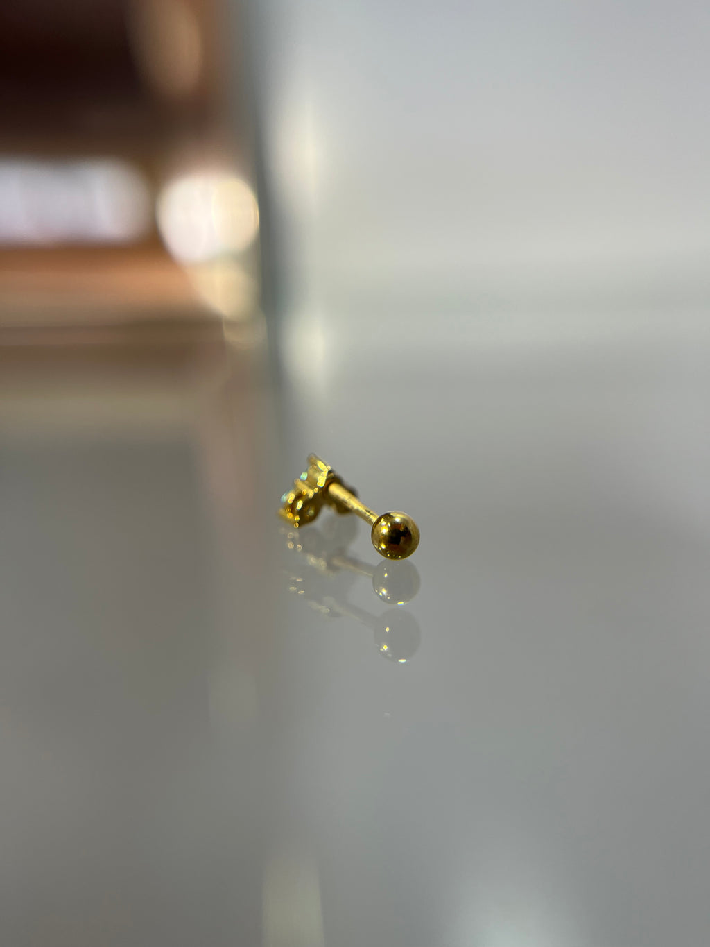 Piercings brillitos celeste (cierre esfera)