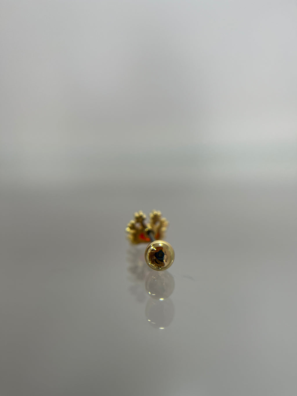 Piercing cangrejo titanium dorado (cierre bolilla)