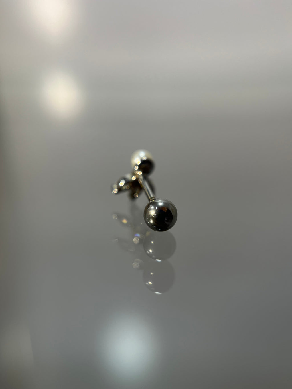 Piercings flor perla (cierre esfera)