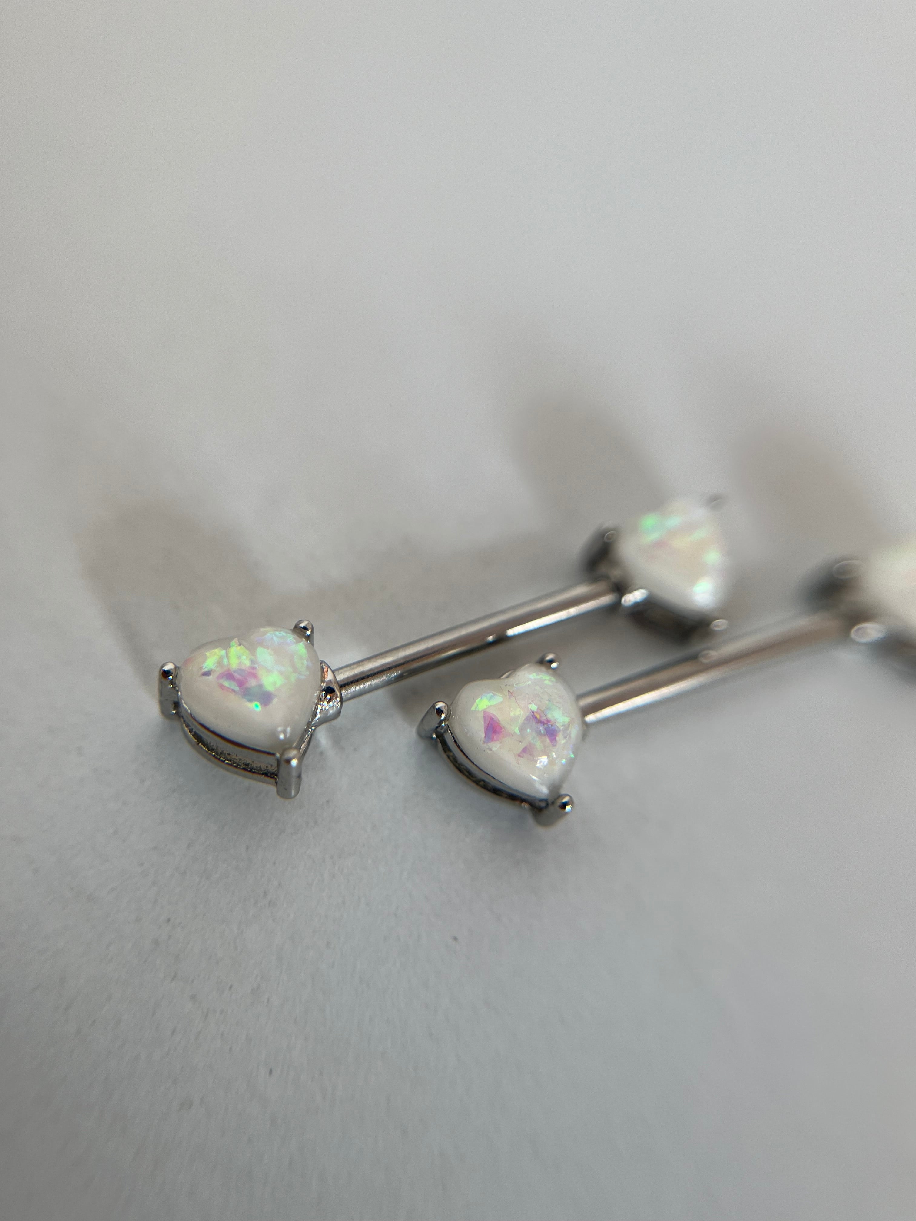 Piercing pezones corazón tornasol
