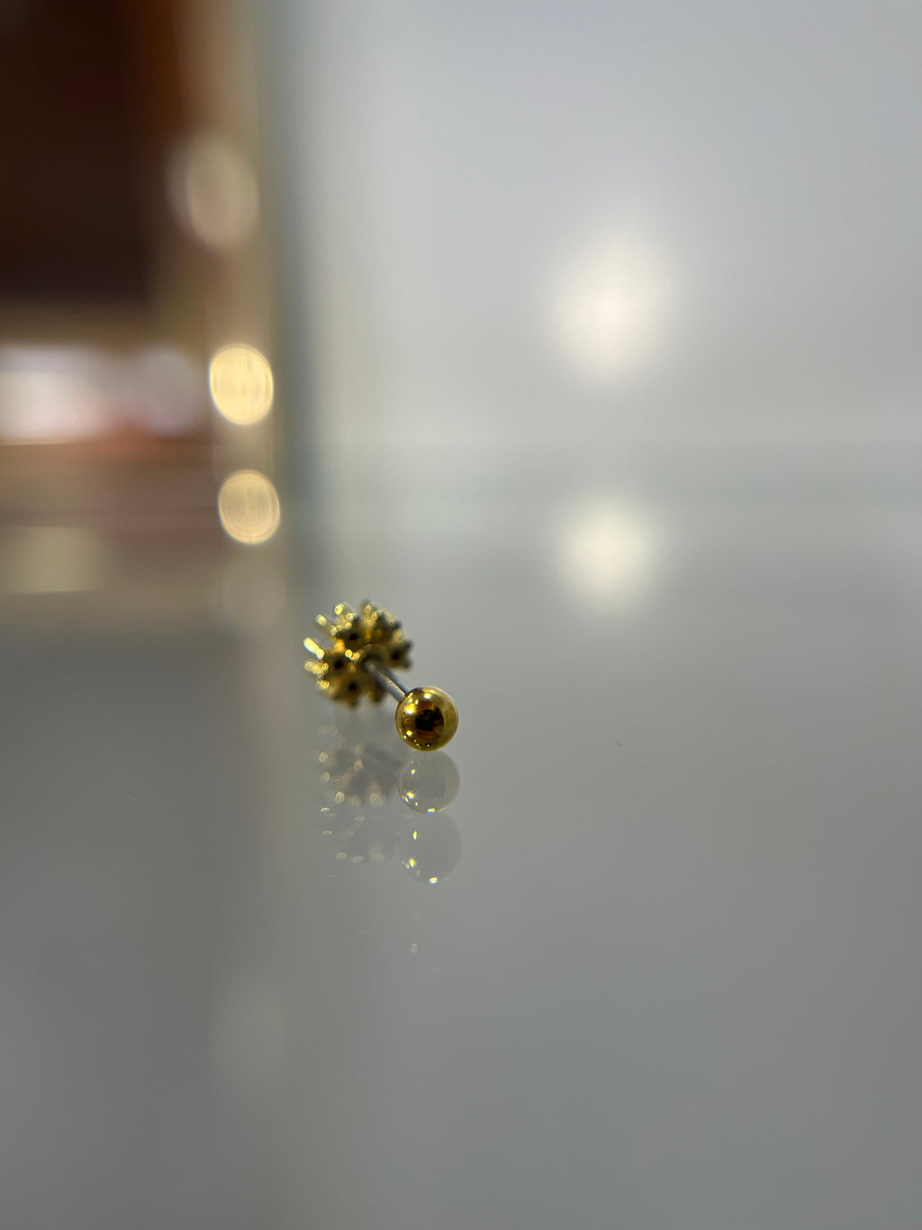 Piercings flor tornasol (cierre esfera)