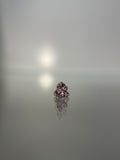 Piercings flor rosa (cierre plano)