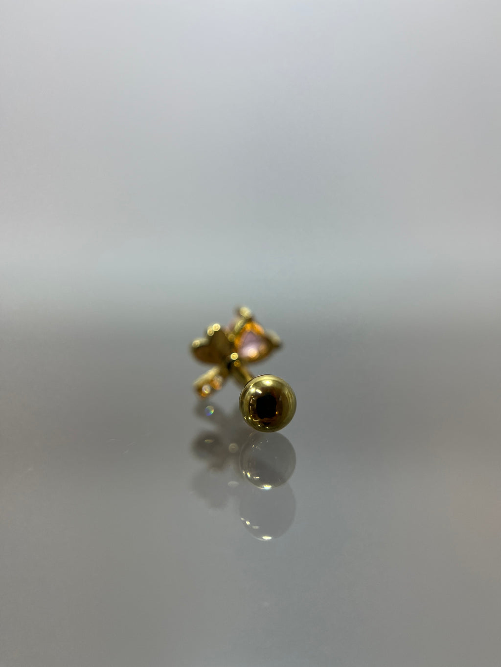 Piercing lazo corazón titanium dorado (cierre bolilla)