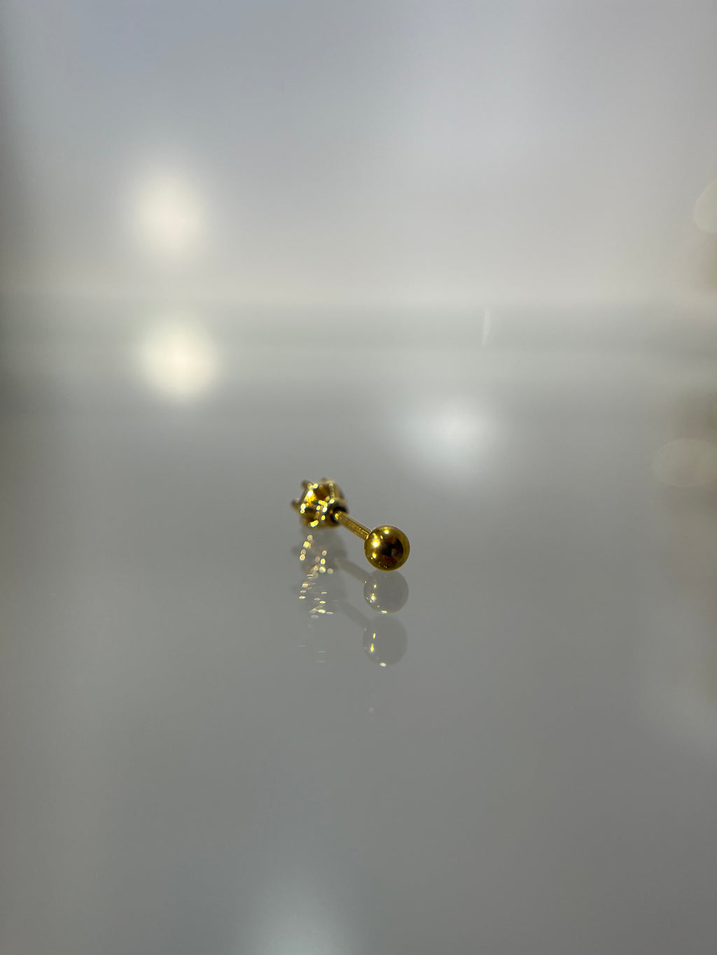 Piercings brillo celeste (cierre esfera)