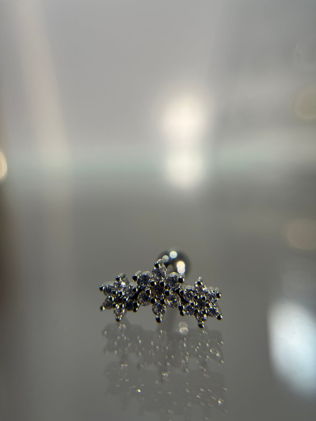 Piercings flor diamante (cierre esfera)