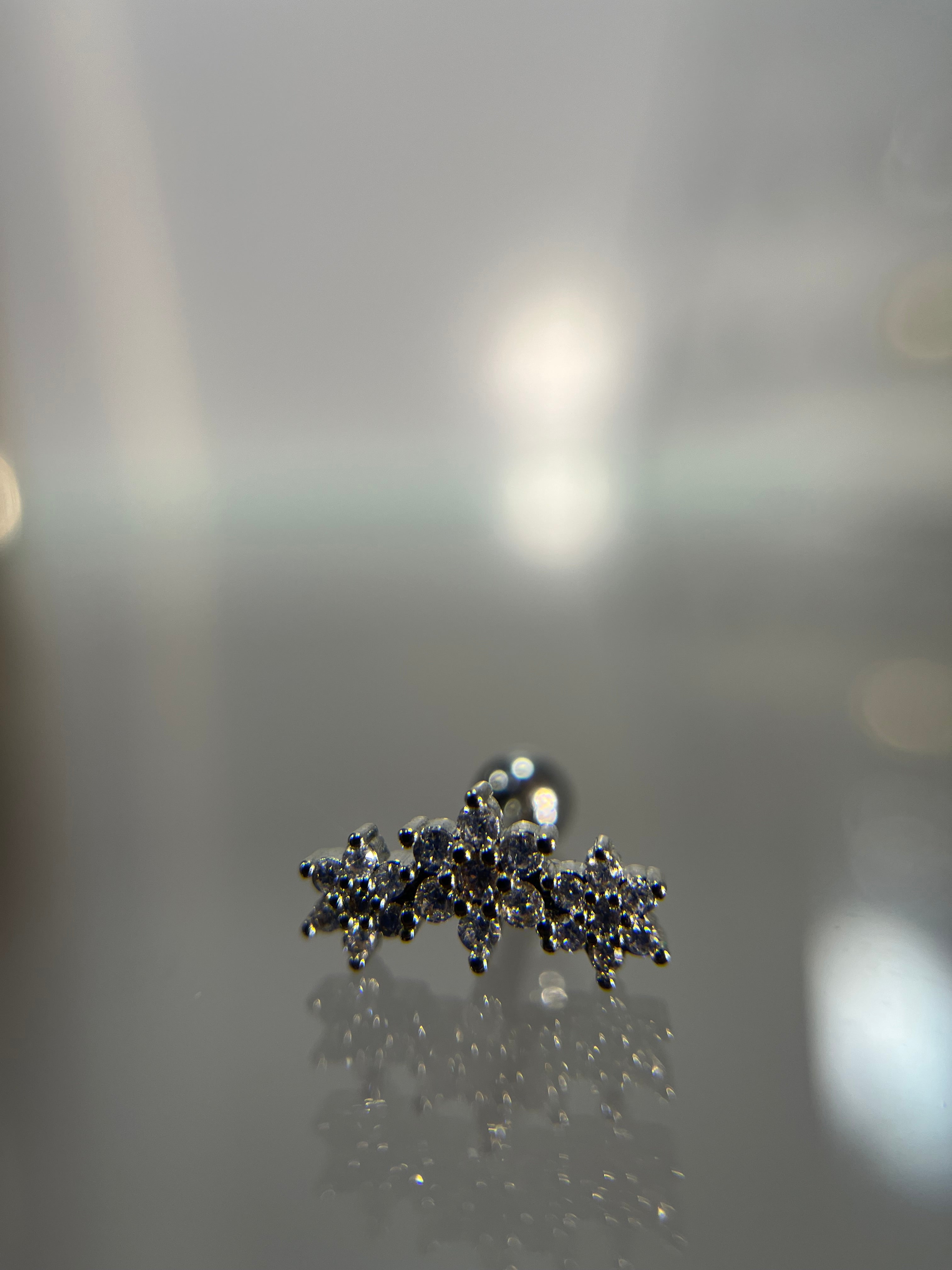 Piercings flor diamante (cierre esfera)