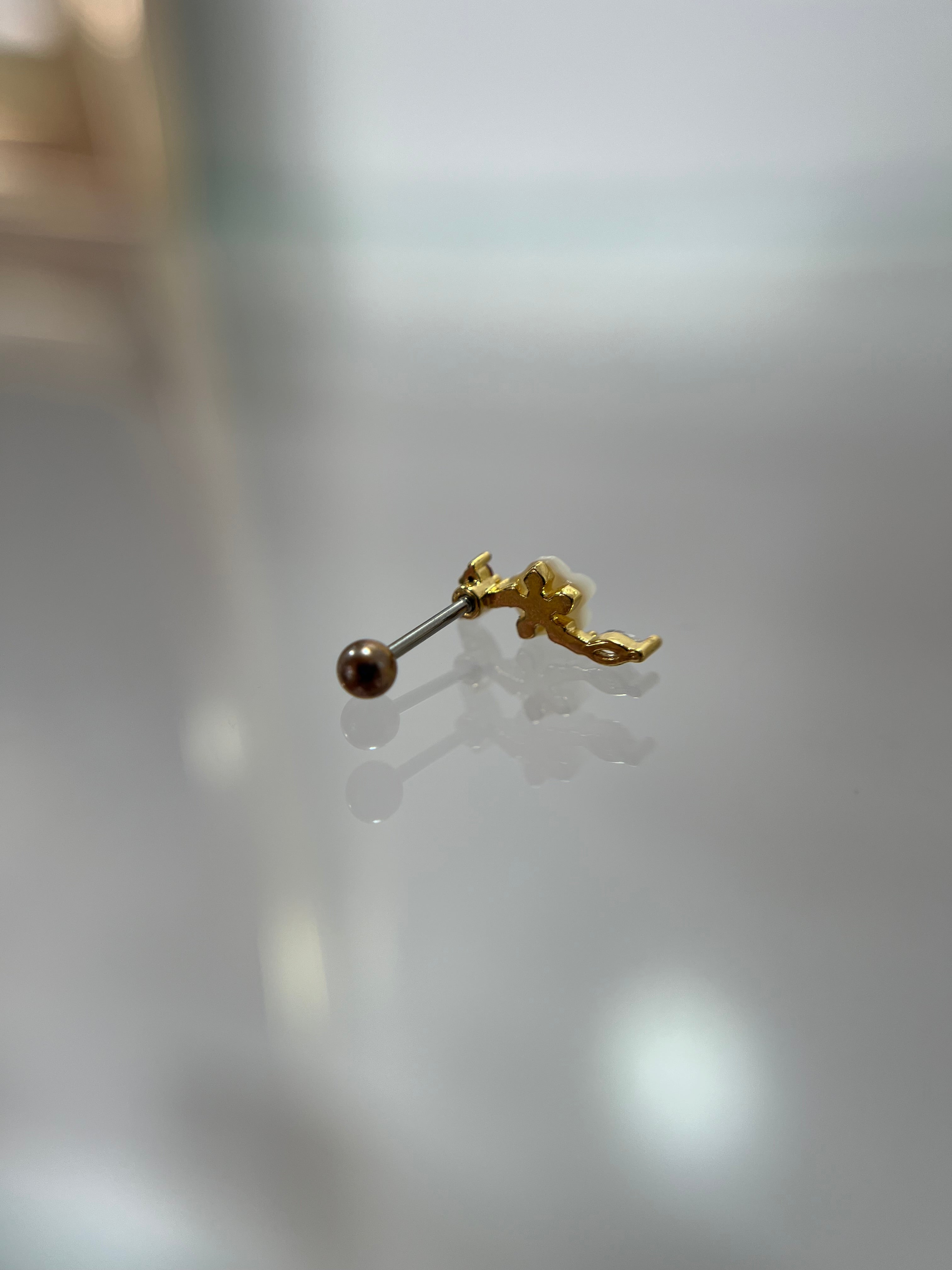 Piercings flor (cierre esfera)