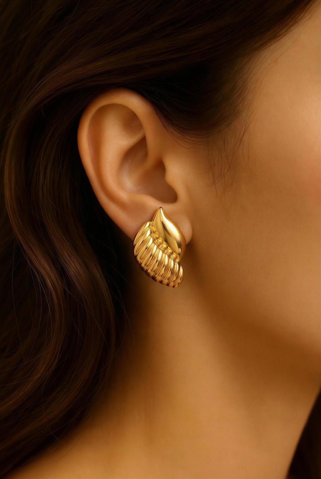 Pendientes de caracol dorados