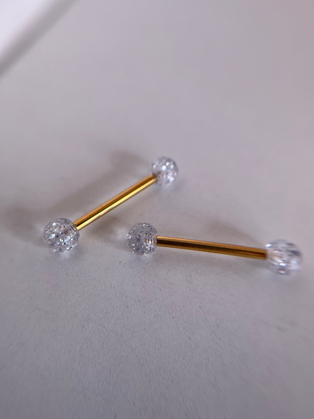 Piercings pezones esfera transparente