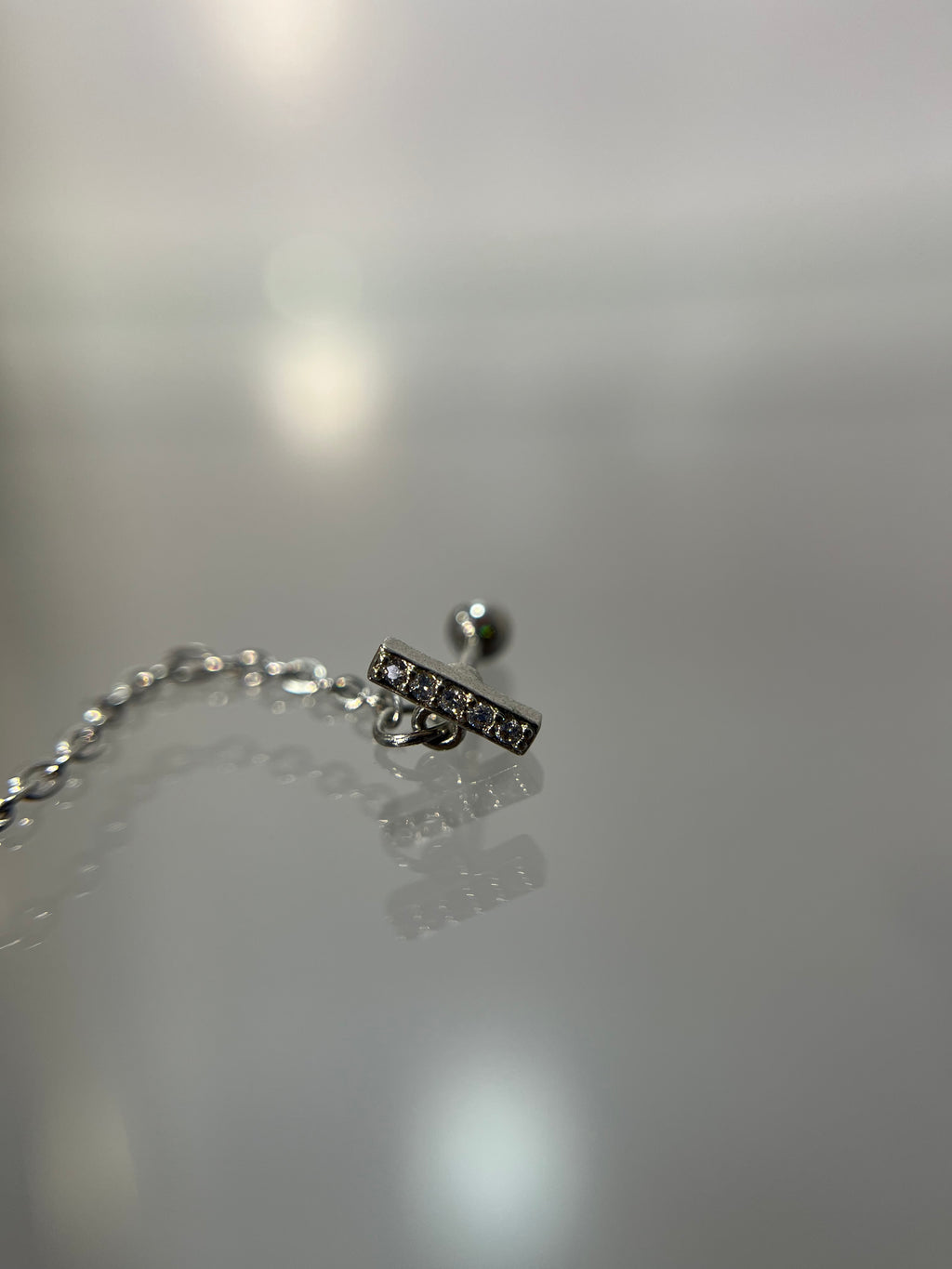 Piercing cadena colgante (cierre esfera)