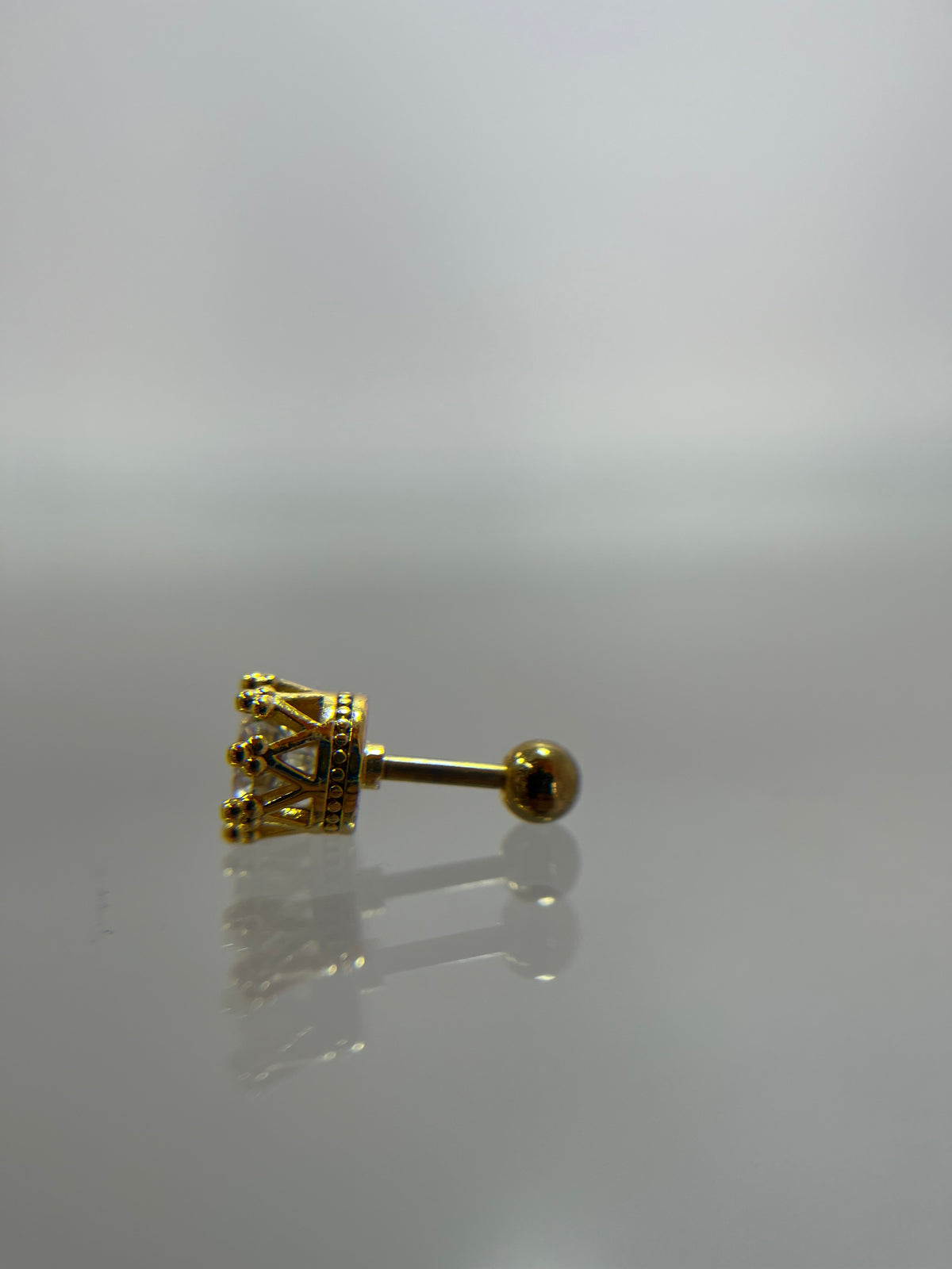 Piercing redondo corona titanium dorado (cierre bolilla)
