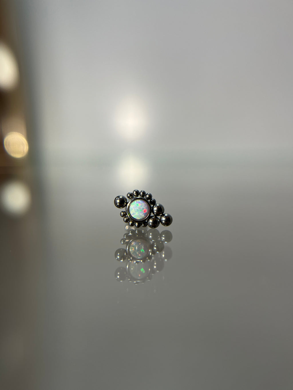 Piercings tornasol (cierre plano)