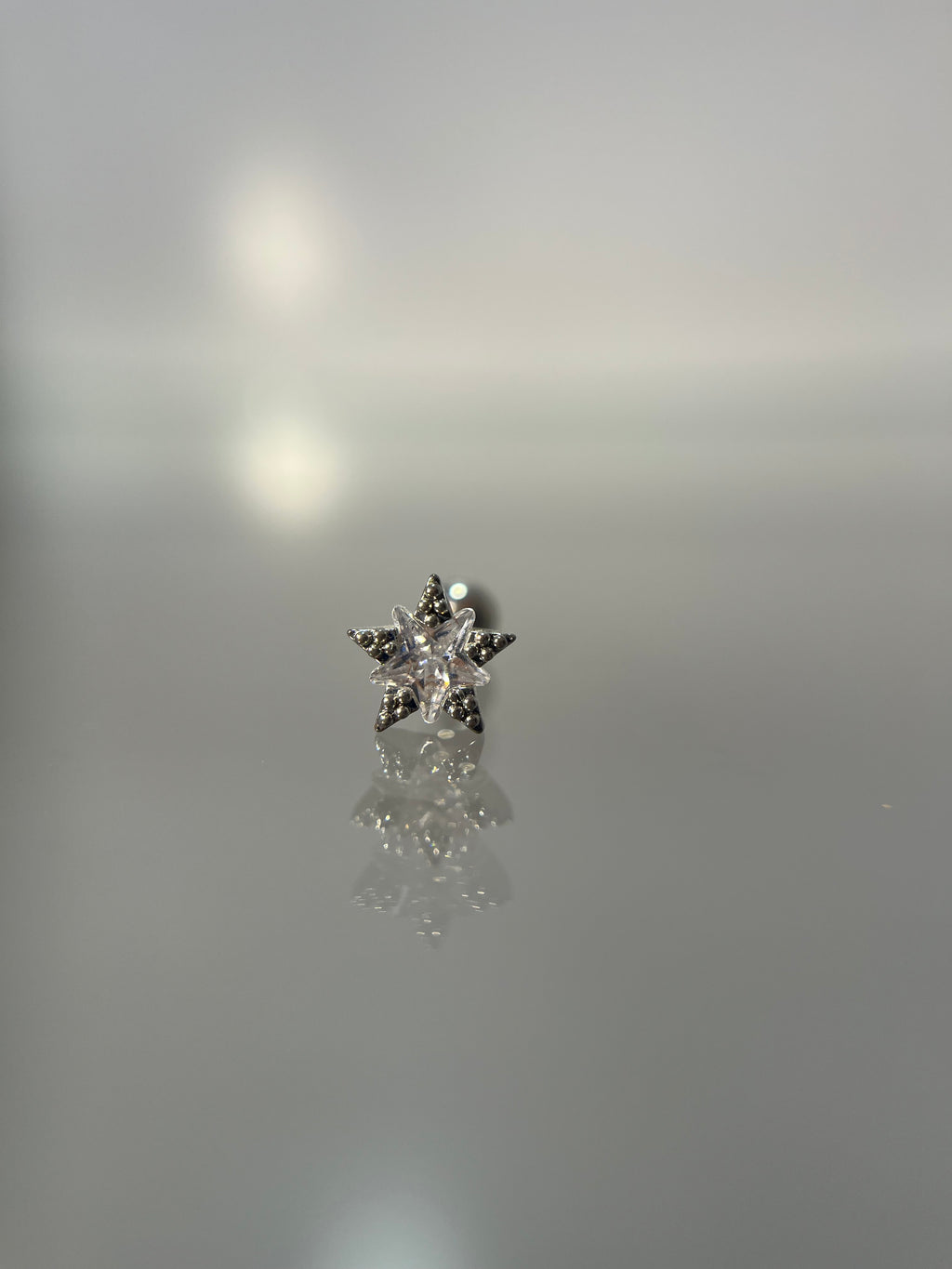 Piercings estrella (cierre esfera)