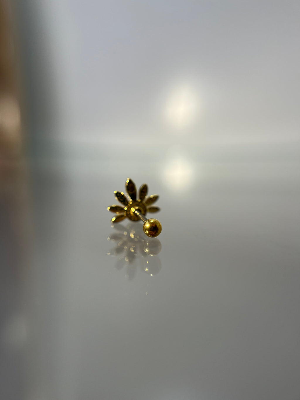 Piercings flor (cierre esfera)