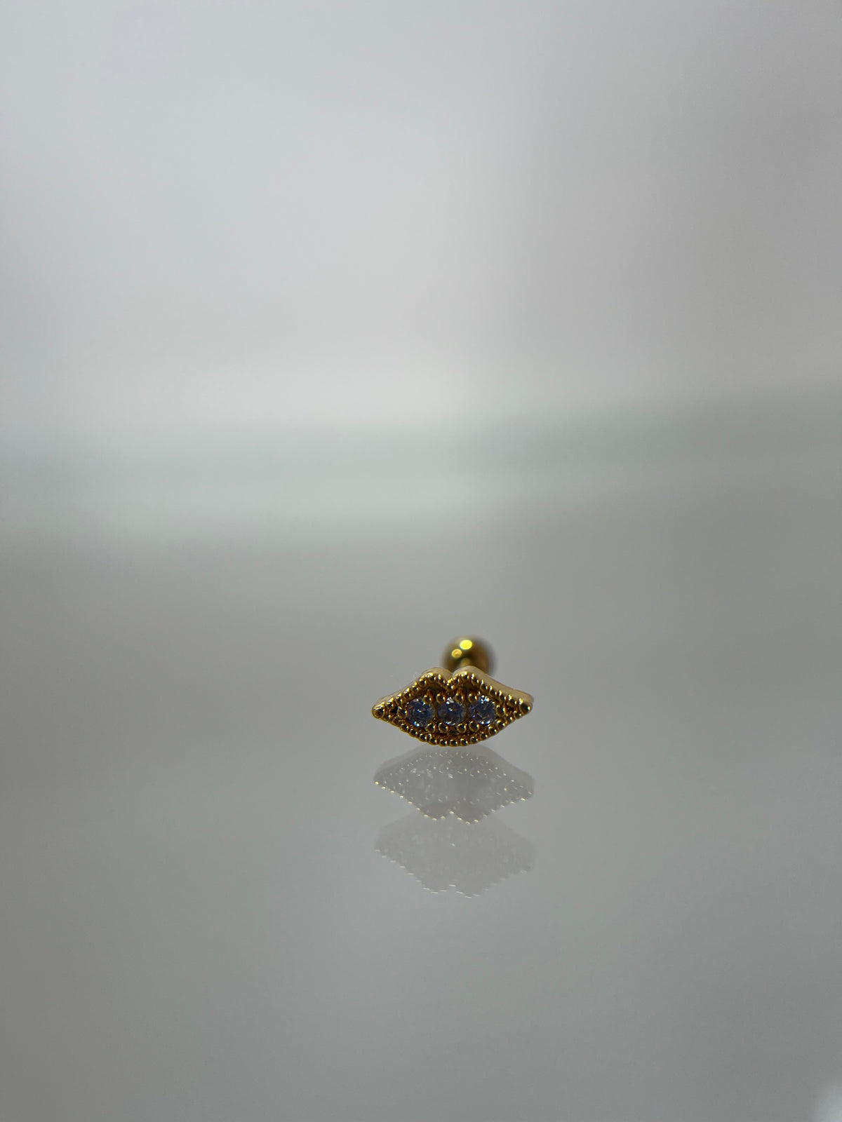 Piercing labios titanium dorado (cierre bolilla)