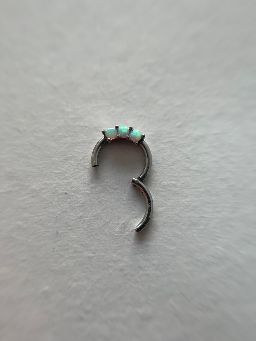 Piercings con cristal tornasol