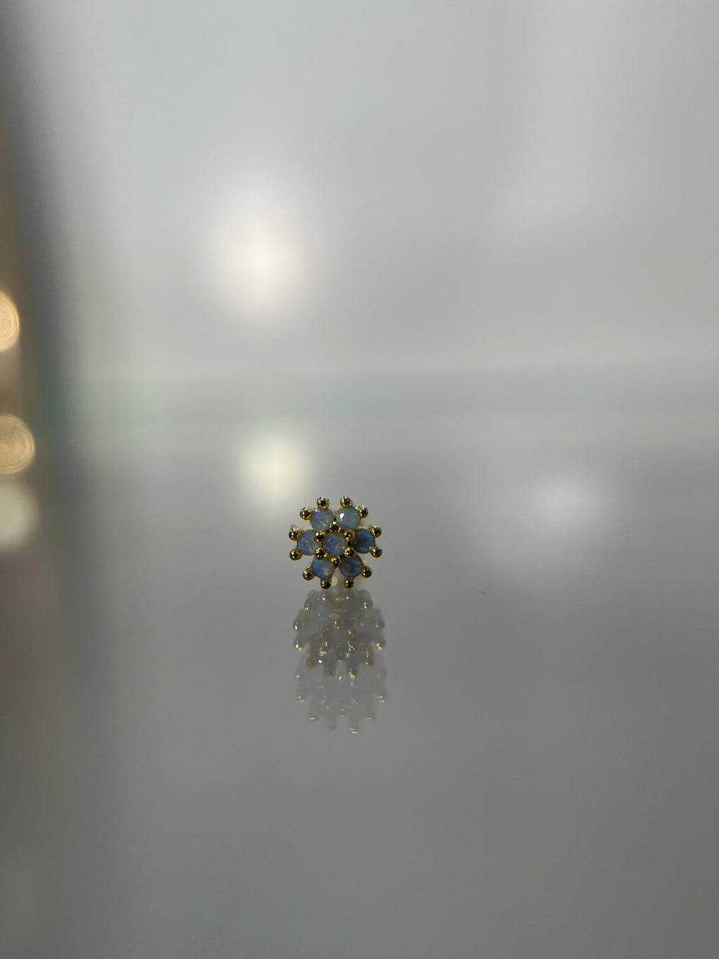 Piercings flor tornasol (cierre esfera)