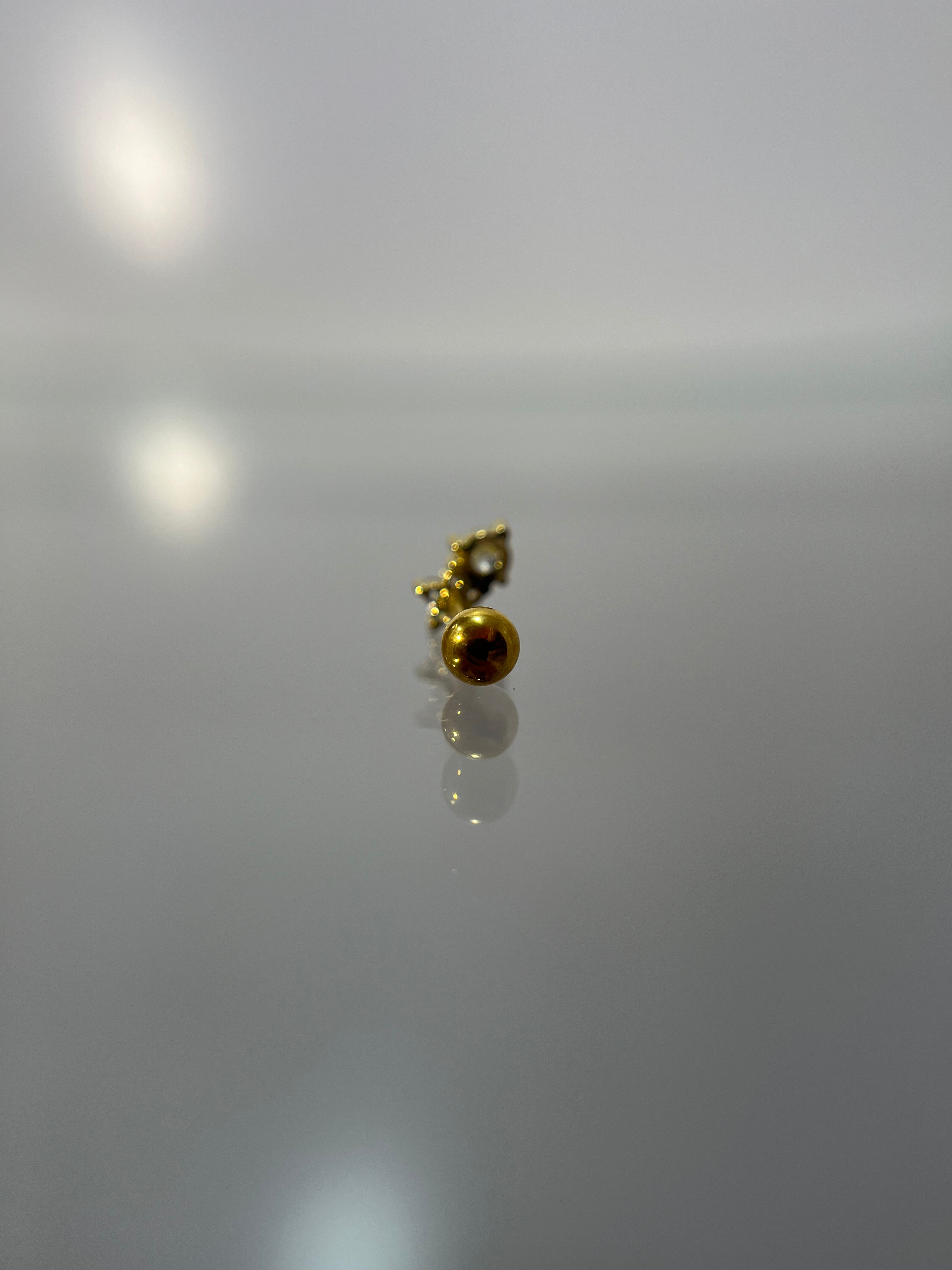Piercings flor (cierre esfera)