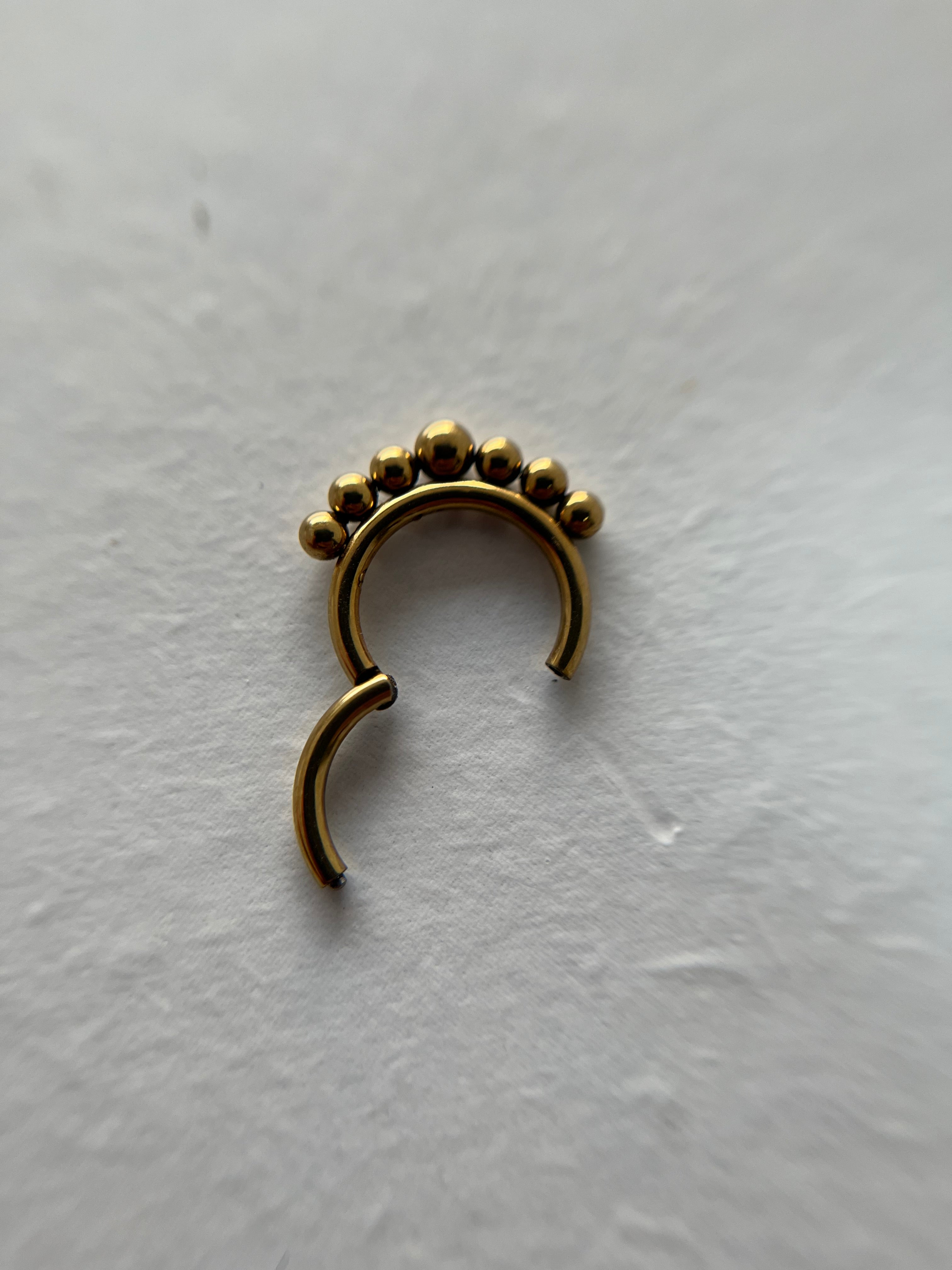 Piercings bolitas