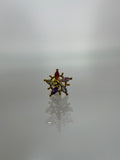 Piercing estrella titanium dorado (cierre bolilla)