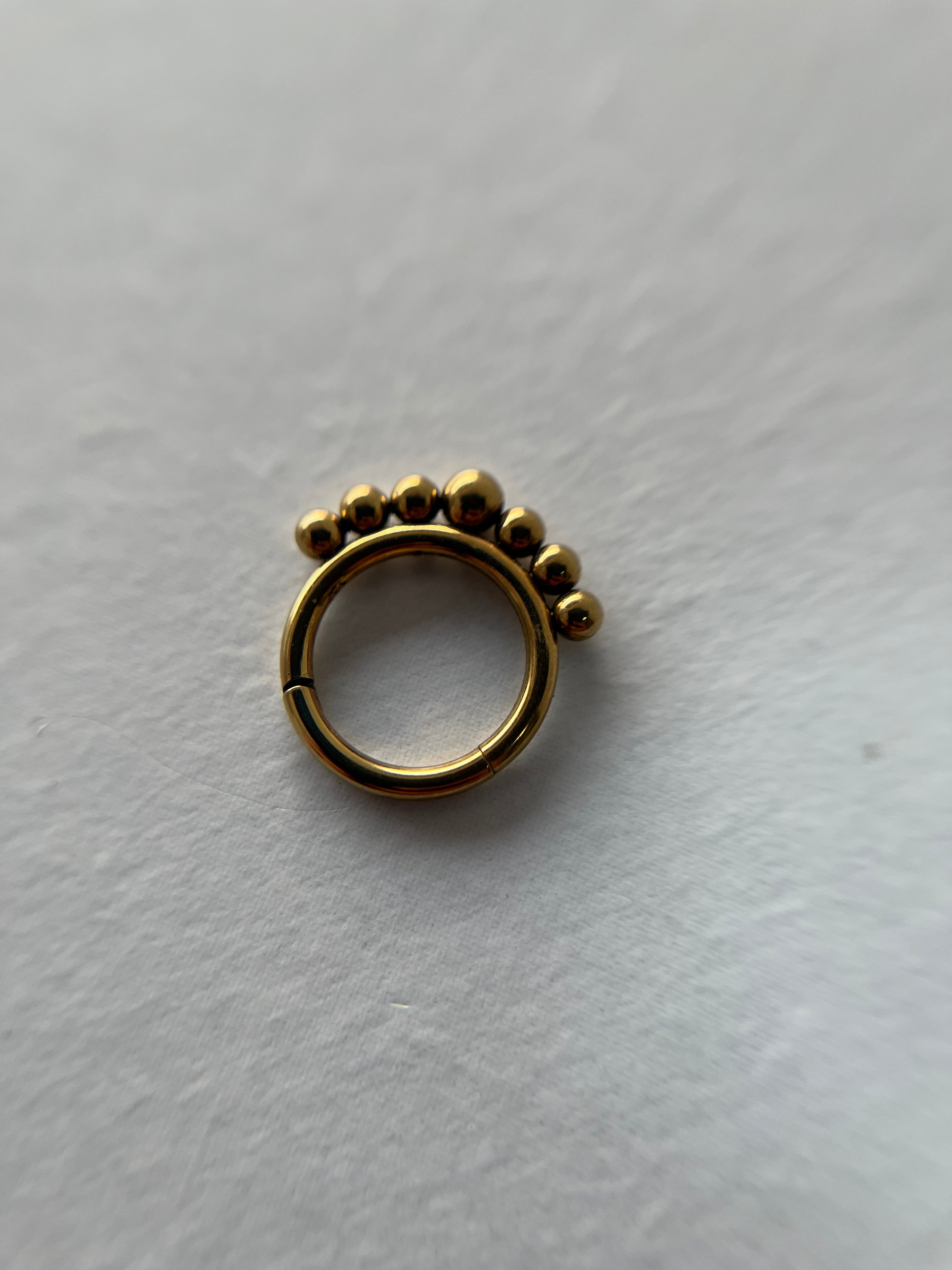 Piercings bolitas