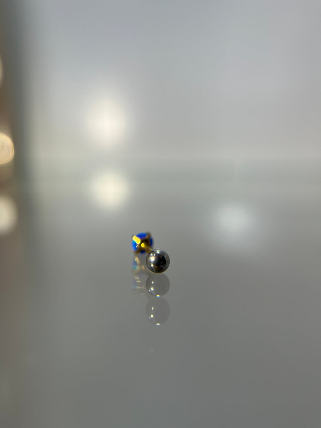 Piercings perla azul (cierre esfera)