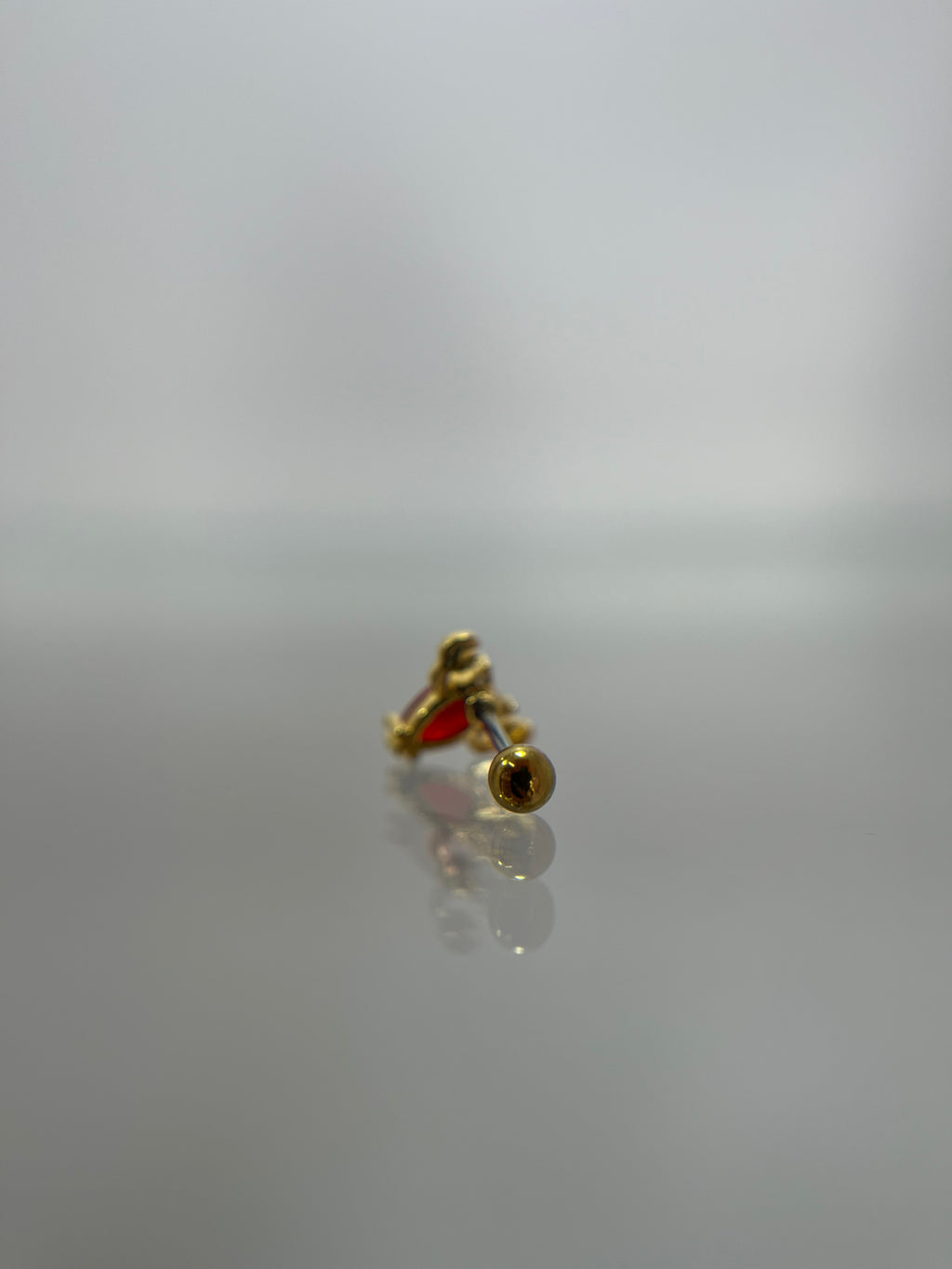 Piercing langosta titanium dorado (cierre bolilla)
