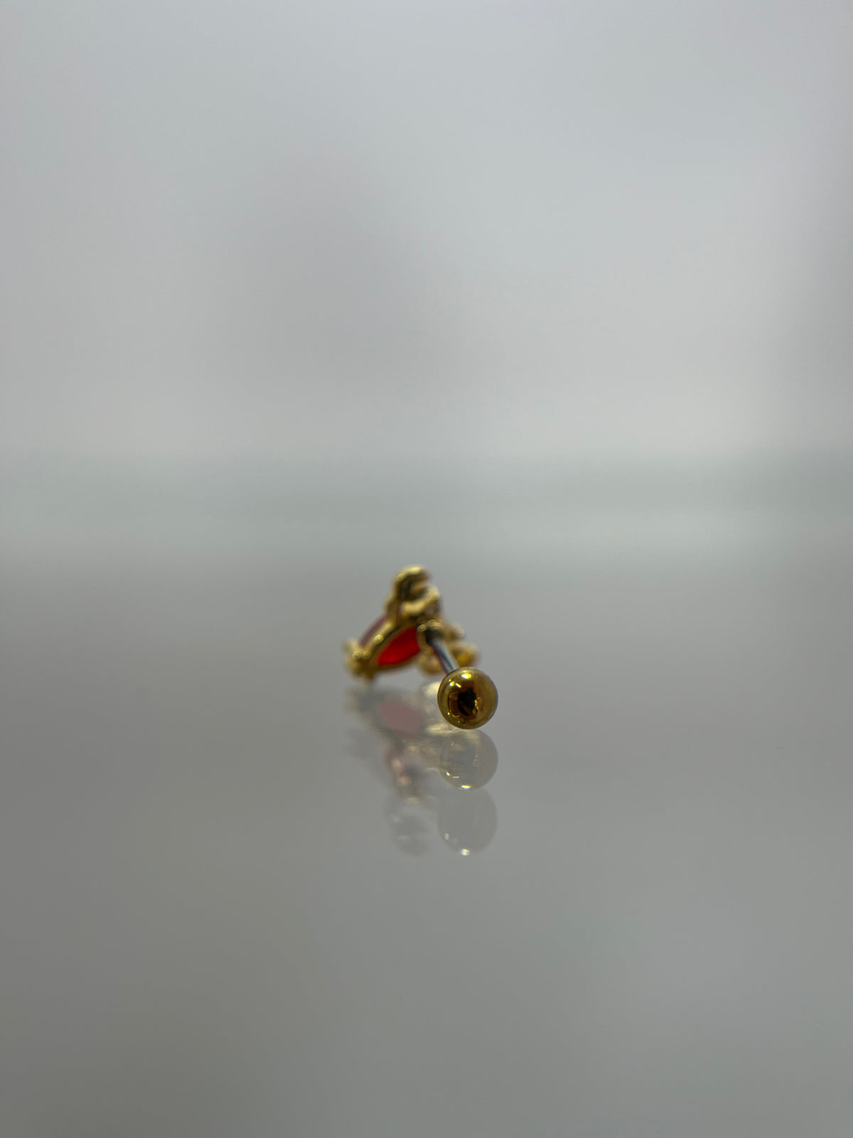Piercing langosta titanium dorado (cierre bolilla)