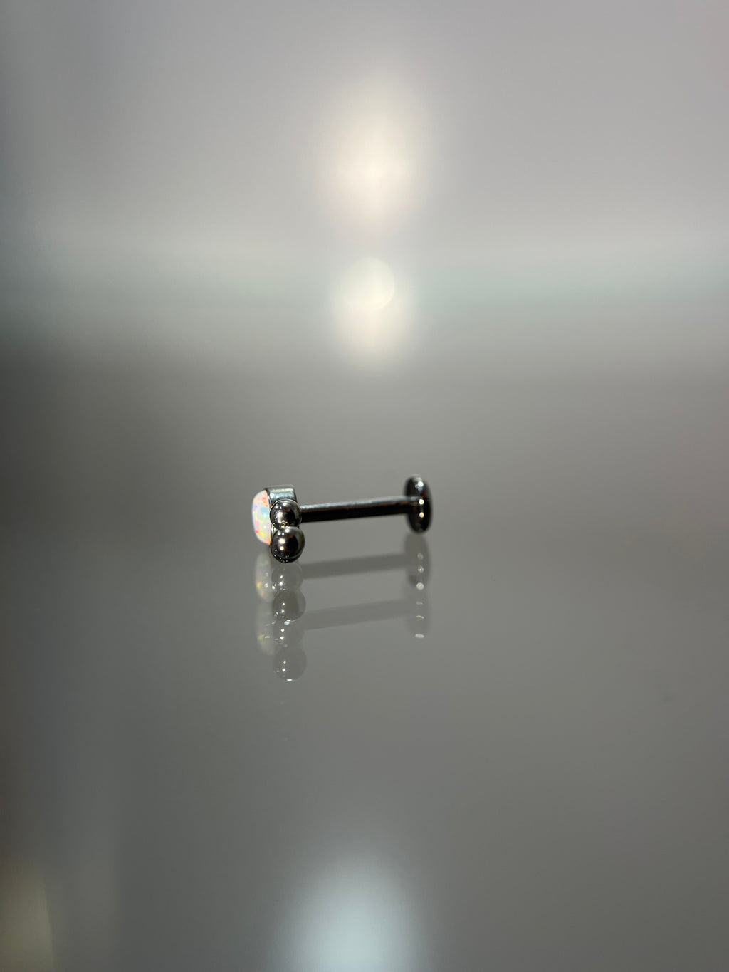 Piercings tornasol (cierre plano)