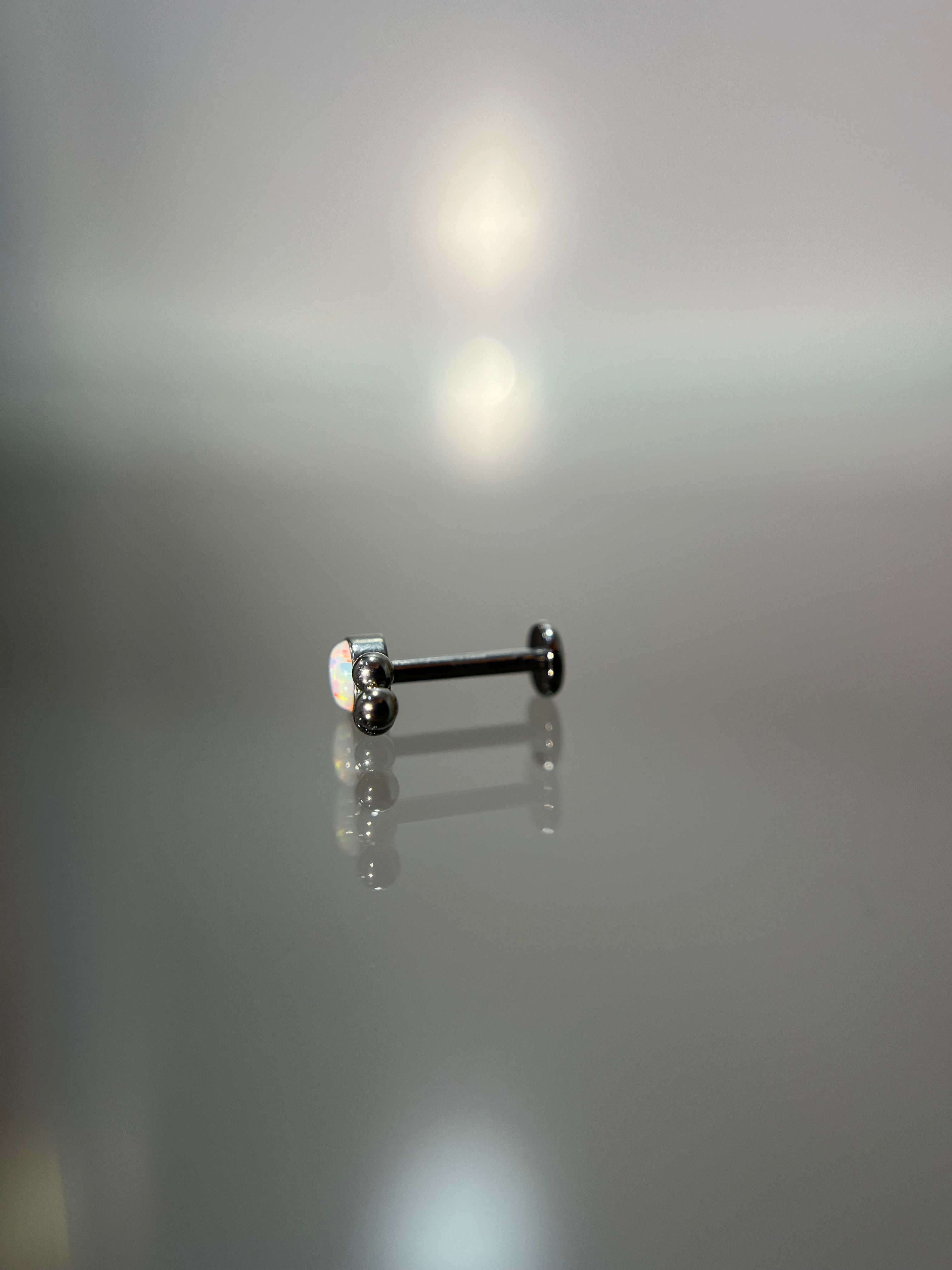 Piercings tornasol (cierre plano)
