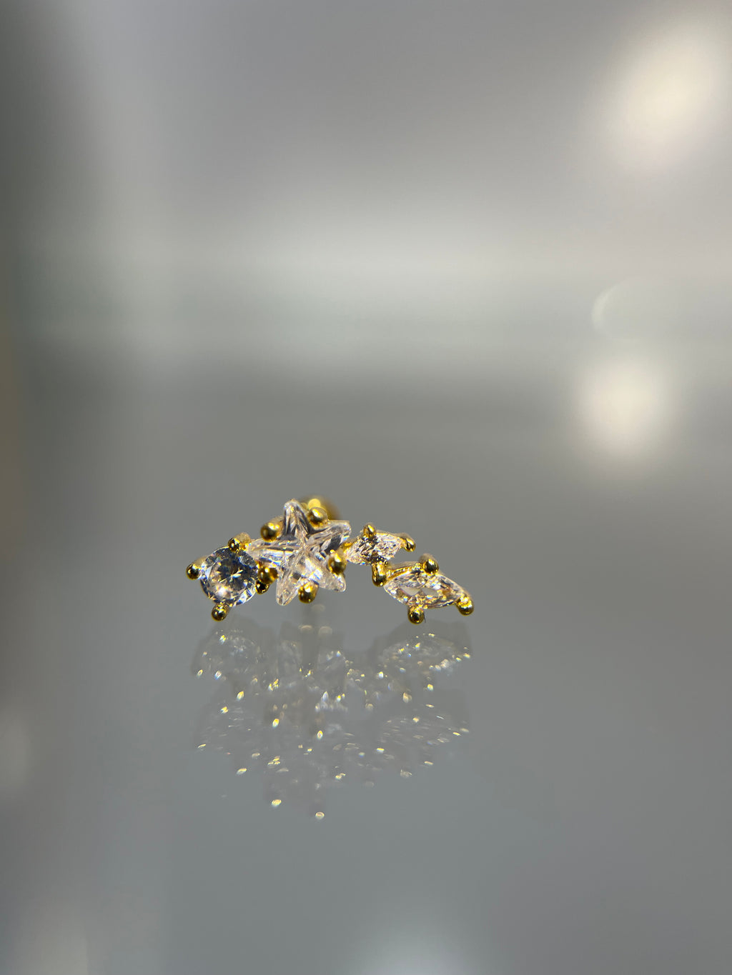 Piercings estrella (cierre esfera)