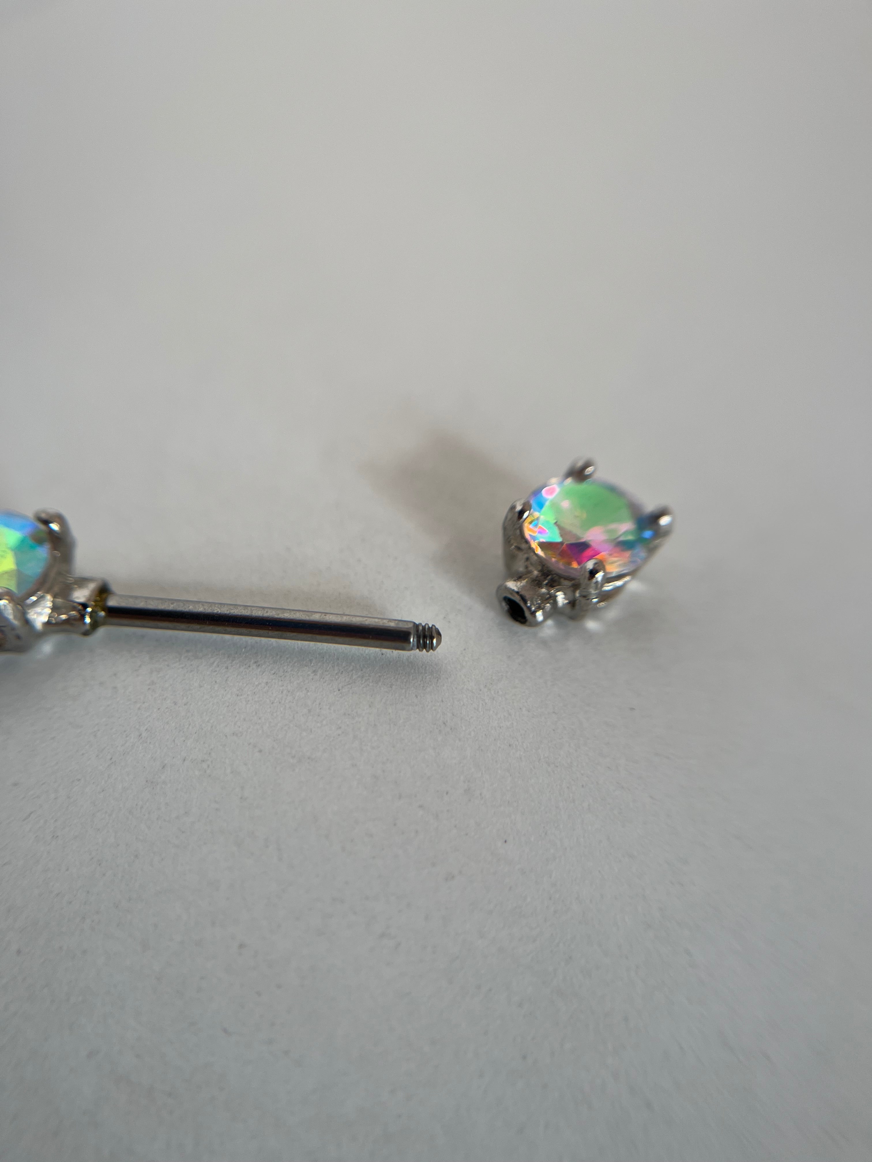 Piercings pezones diamantes