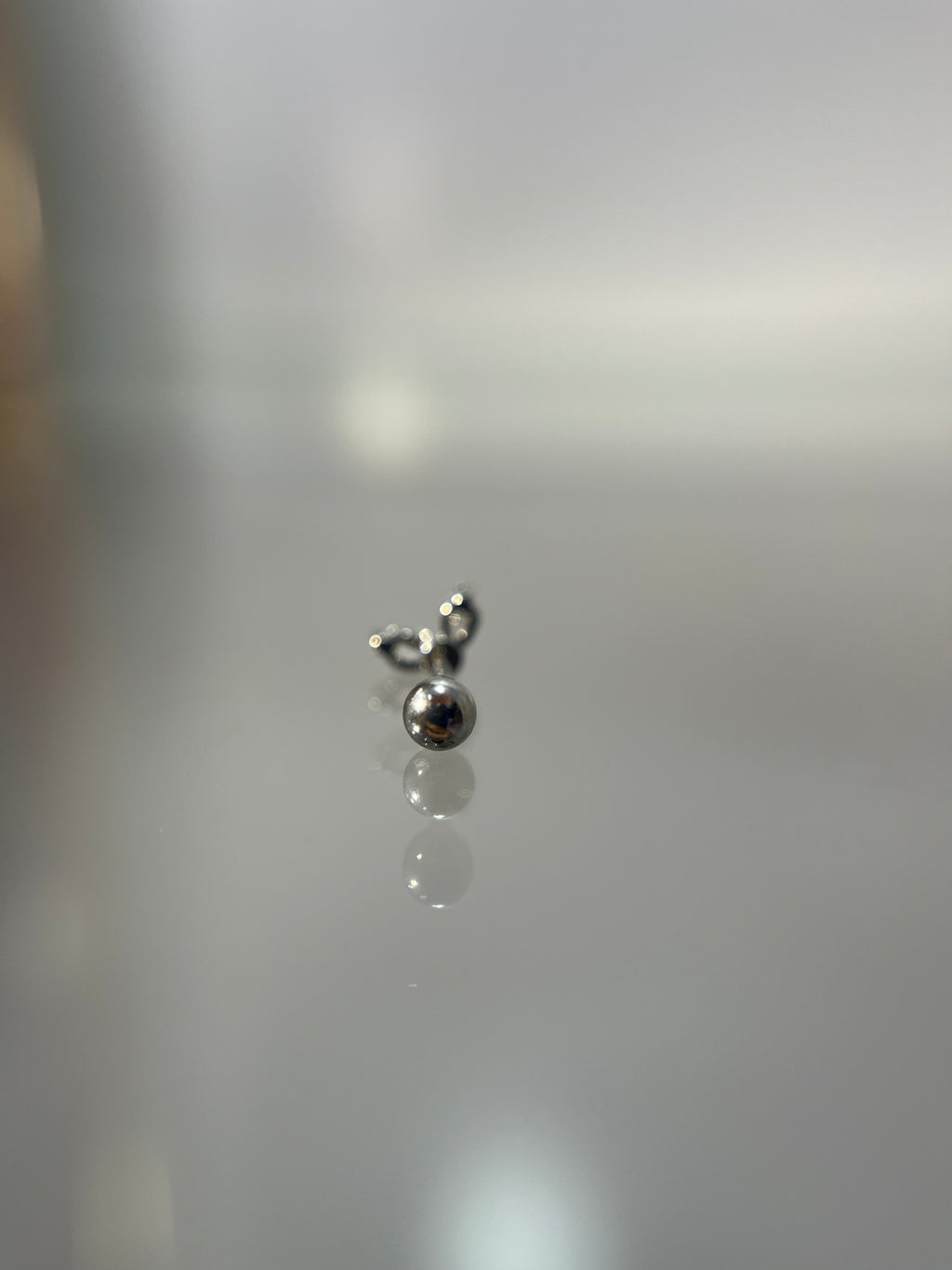 Piercings alitas (cierre esfera)