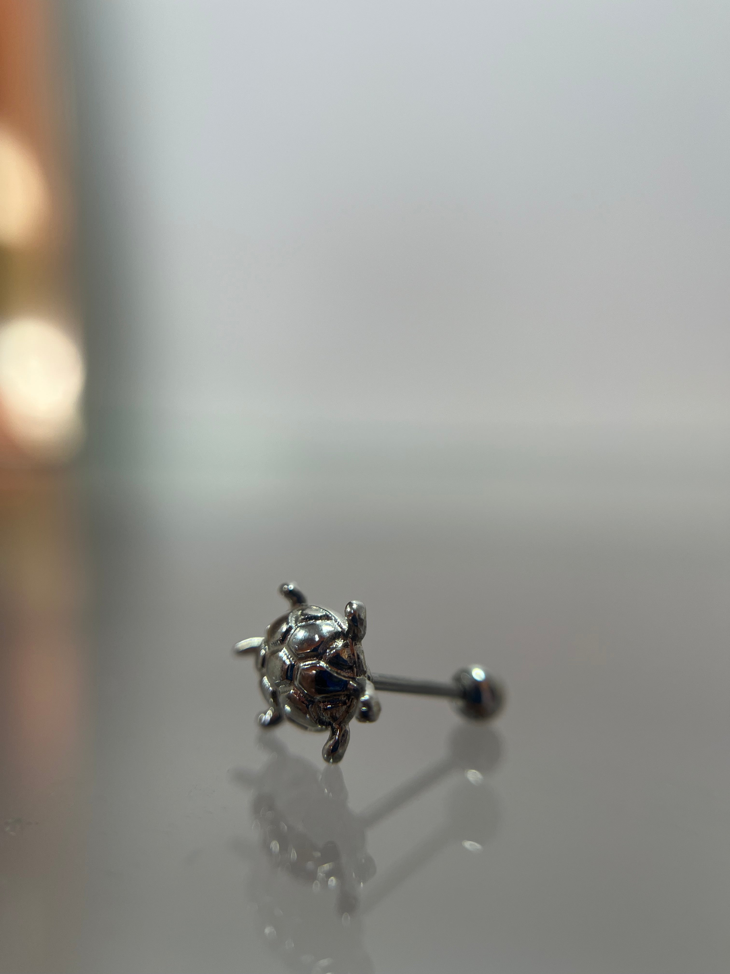 Piercing de tortuga (Cierre de esfera)