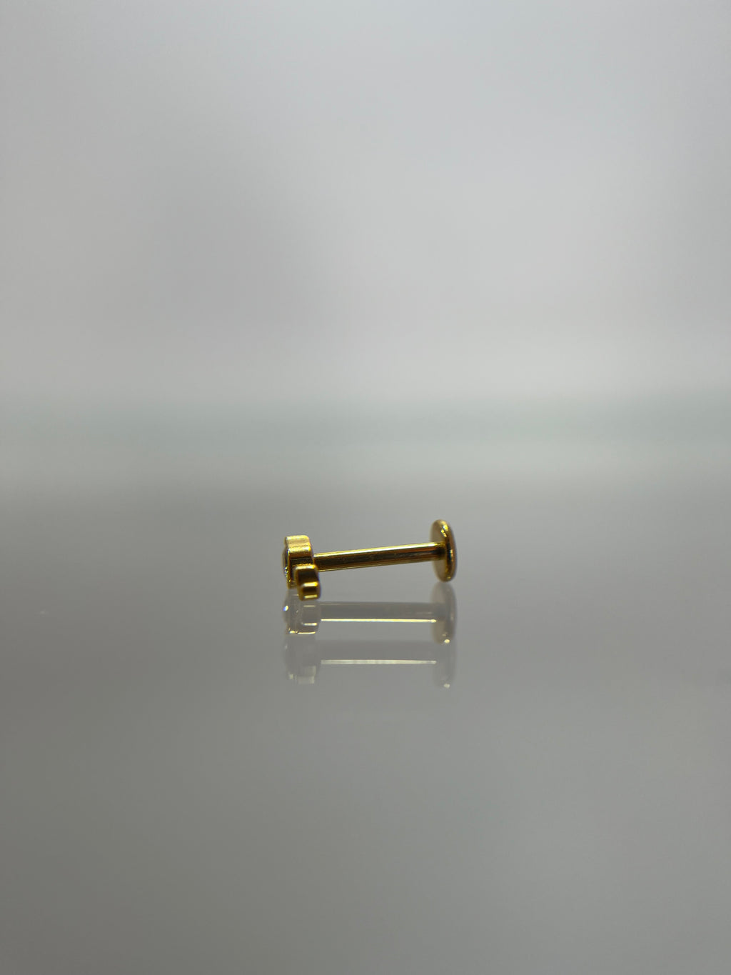 Piercing capullo de flor titanium dorado (cierre plano)