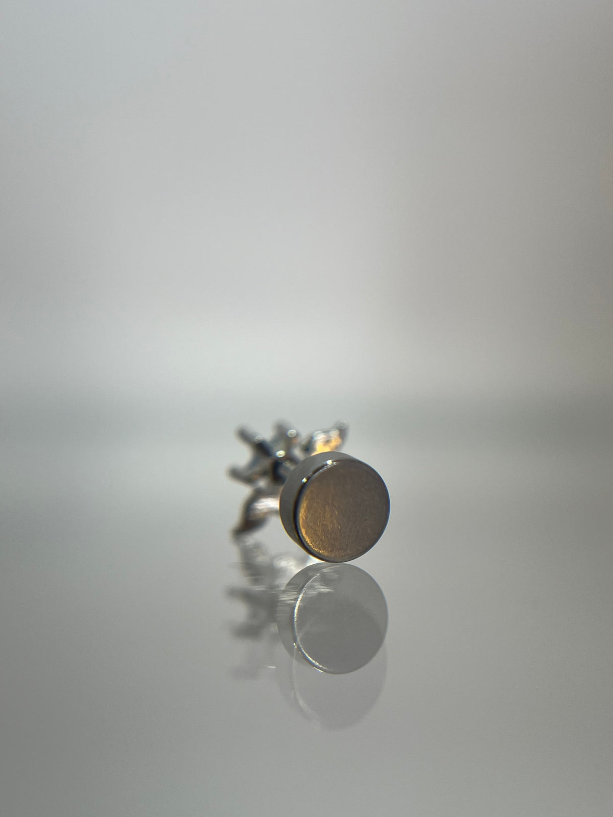 Piercing luna alada acero plateado (cierre plano)