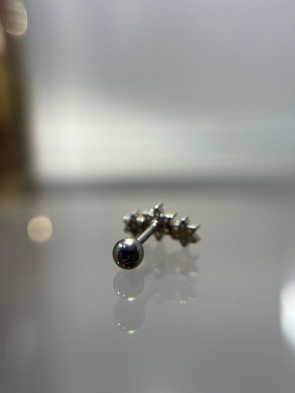 Piercings flor diamante (cierre esfera)