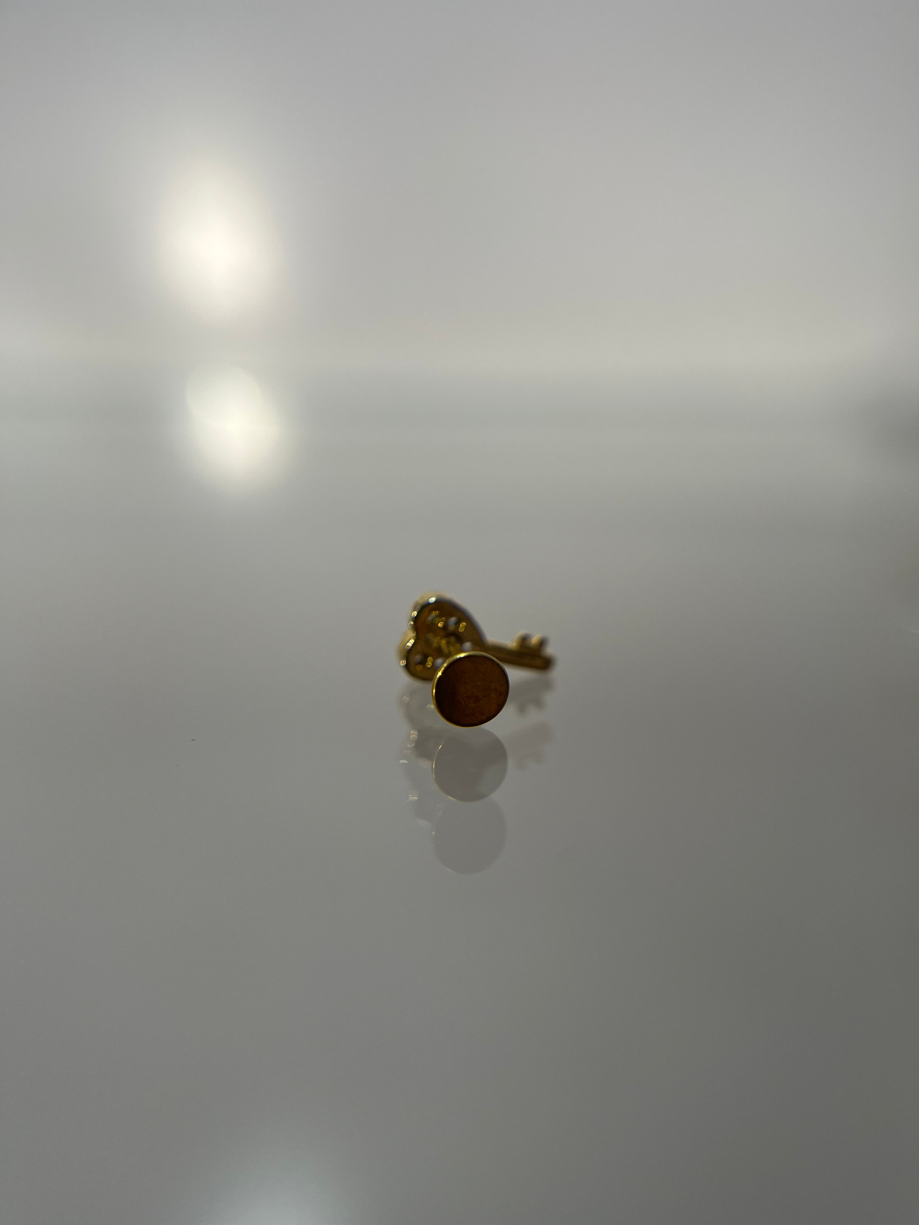Piercings llave corazón (cierre plano)