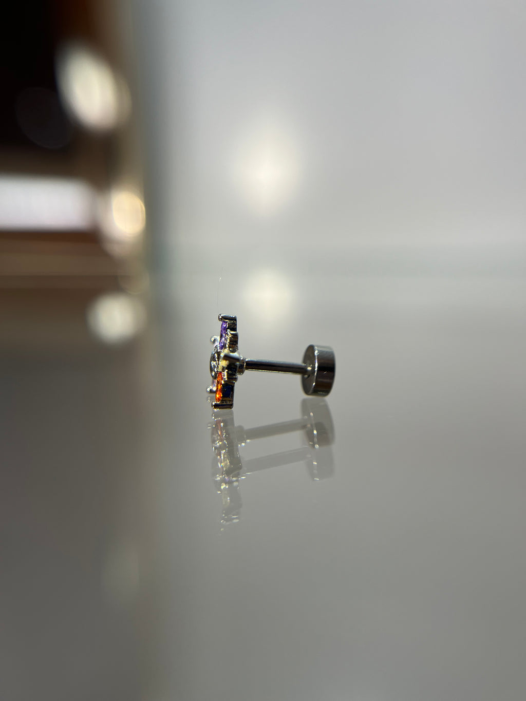 Piercings estrella (cierre plano)