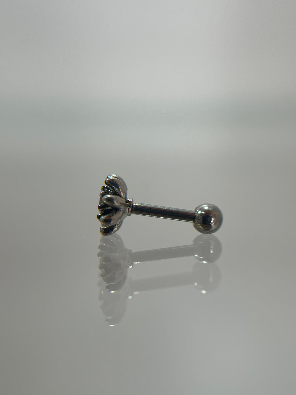 Piercing flor cristal acero plateado (cierre bolilla)