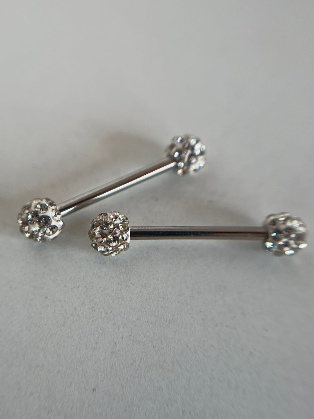 Piercings pezones esfera con cristal incrustado