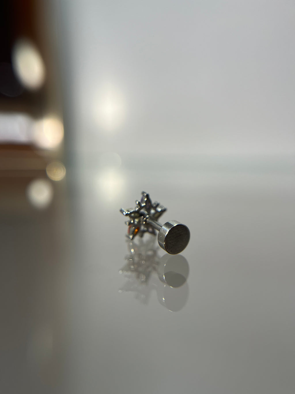 Piercings estrella (cierre plano)