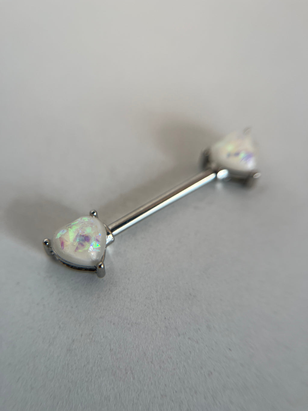 Piercing pezones corazón tornasol