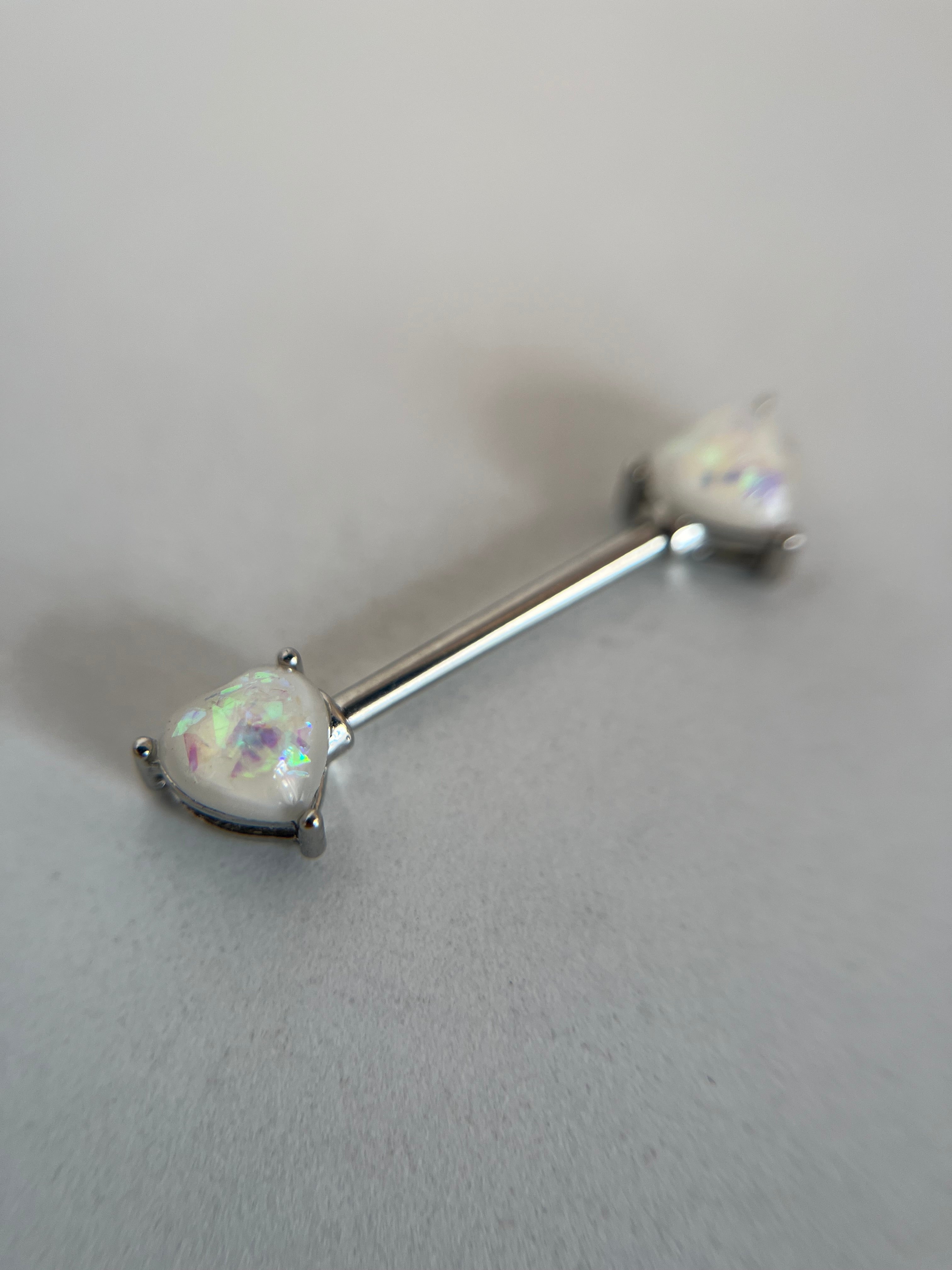 Piercing pezones corazón tornasol