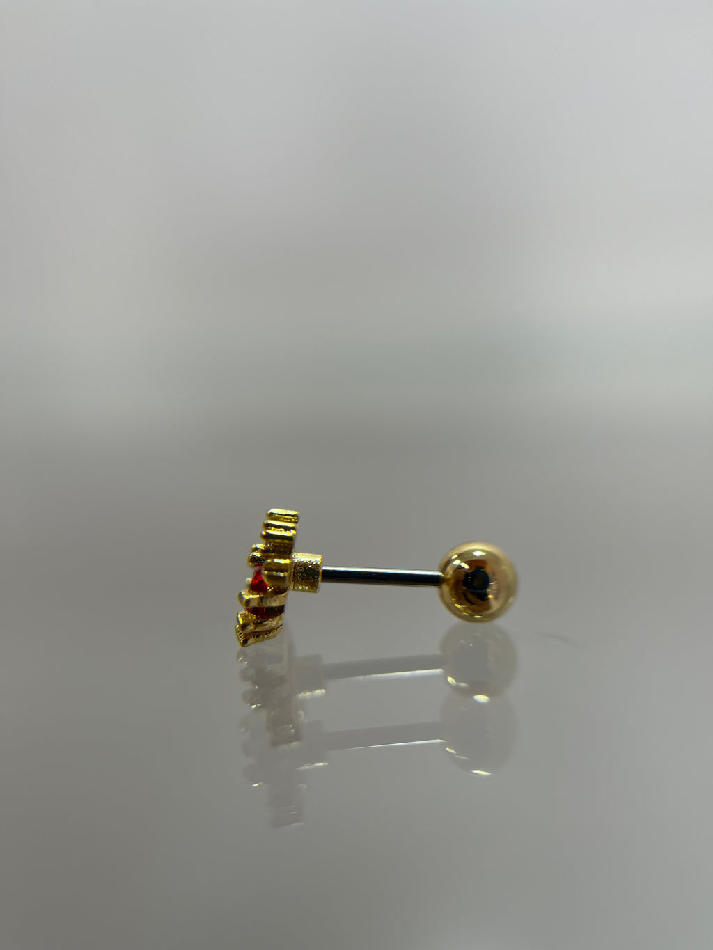 Piercing cangrejo titanium dorado (cierre bolilla)