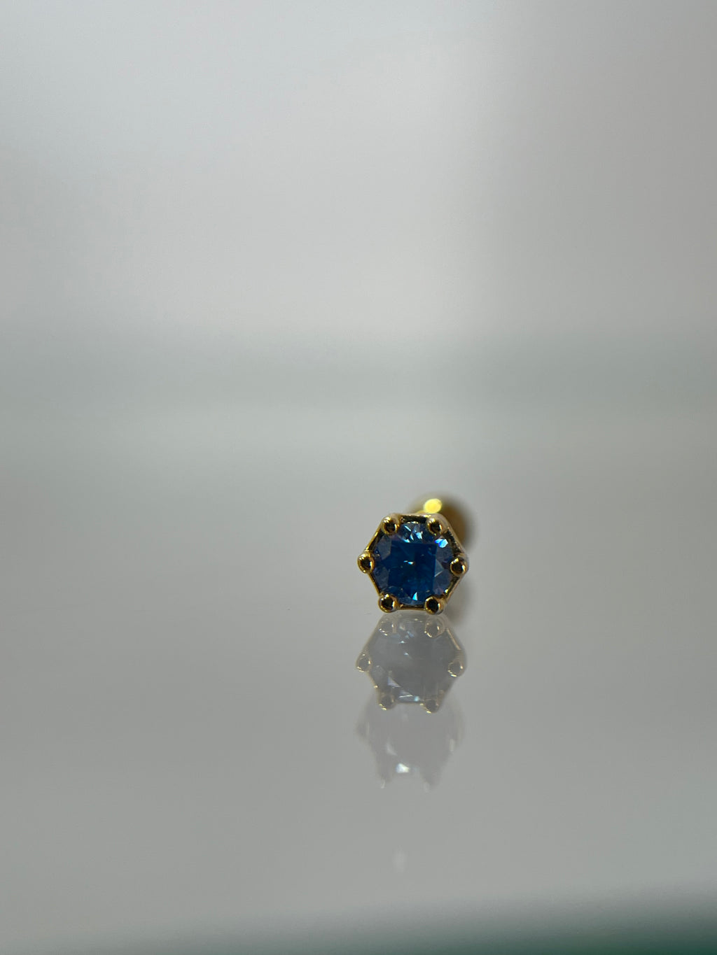 Piercing gema dorado titanium  (cierre bolilla)