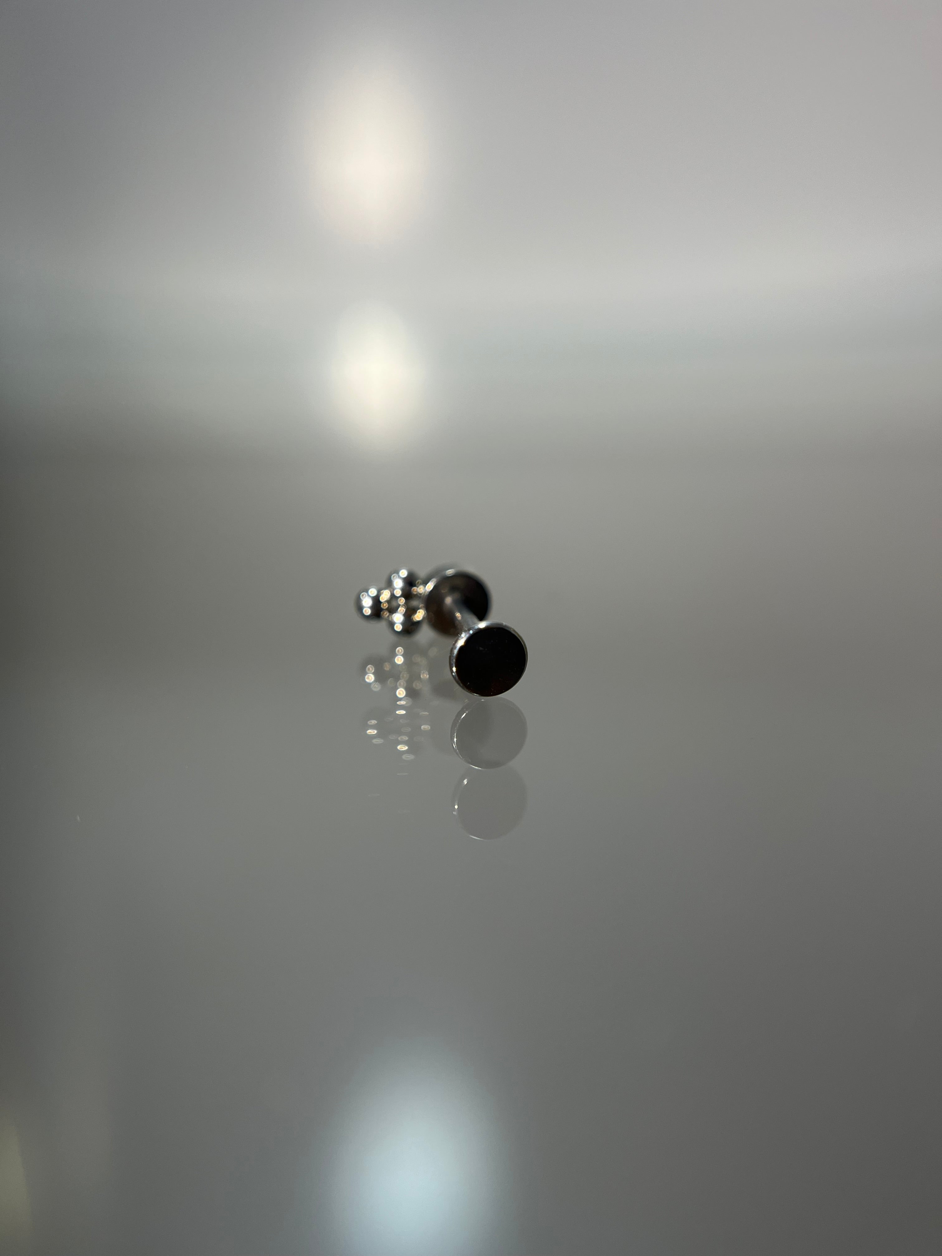 Piercings tornasol (cierre plano)