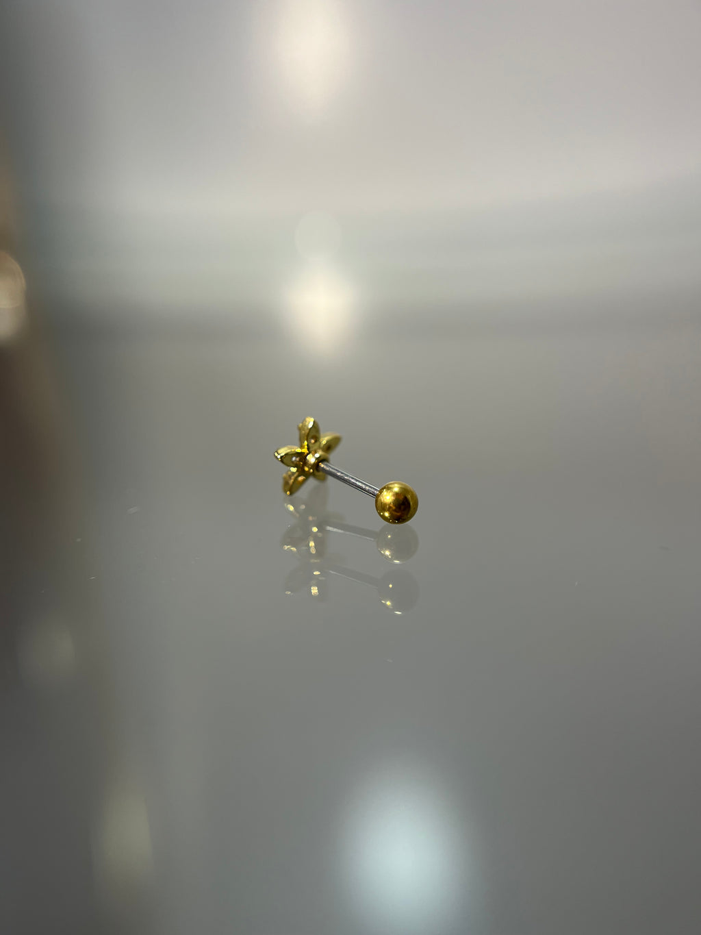 Piercings flor (cierre esfera)